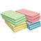 Stacks of various colored sticky note pads. Yellow, green, pink, and blue.