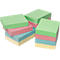 Several stacks of colorful sticky notes in green, pink, blue, and yellow.