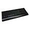 Schwarze Gaming-Tastatur mit RGB-Beleuchtung und Handballenauflage vor weißem Hintergrund.