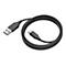 Schwarzes USB-C-Kabel mit USB-A-Anschluss, in Form einer Spirale auf weißem Hintergrund.