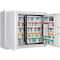 Open white key safe with keys organized by color.