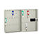 An open grey key cabinet with keys on colored tags.