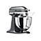 Dunkelgraue KitchenAid Artisan Küchenmaschine mit polierter Edelstahlschüssel vor weißem Hintergrund.