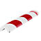 Corner protector with red and white stripes. Protection against injuries on furniture edges.
