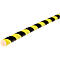Yellow and black bollard. Cylindrical shape with alternating black and yellow stripes.