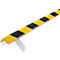Yellow and black corner protection with metal bracket. The product is designed to be mounted on walls or edges.