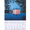 Un calendrier montrant les dates d'octobre 2027. L'image présente un château se reflétant dans une eau calme. Des arbres encadrent la scène.