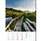 Une passerelle en bois sur un petit lac, avec des montagnes en arrière-plan. Texte : Avril, calendrier 2007, citation.