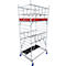 A silver scaffolding with a red platform and black floor, on blue-gray wheels.