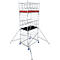 A tall, silver scaffolding. It has rollers and outriggers. On top a red shelf.