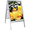 Kundenstopper aus Aluminium mit einem Werbeplakat von frischem Orangensaft und Orangen.