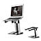 A laptop sits on a silver laptop stand with two parts. A logo with the word "ERGONOMIC" can be seen on the screen.