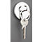 A keychain with a door key hangs from a round, silver-colored magnet on a gray background.