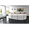 Modern office reception desk, white with brown countertop, bright lighting, artwork on the wall.