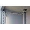 Interior view of a metal cabinet with cables and LED light. Gray color. The viewing angle is slightly from below.