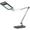 Modern desk lamp, adjustable with its articulated arms. The lamp head is rectangular and emits bright light.