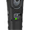 Detail of a black flashlight. Green charging indicator lights up and USB-C port visible.