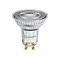 LEDVANCE LED-Reflektorlampe mit klarer Glasstruktur und zwei goldenen Steckkontakten vor weißem Hintergrund.