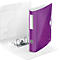 A purple binder with a white spine and floral pattern stands open on white paper.