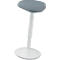An ergonomic white standing stool with a grey seat cushion. The stool has an oval seat and a round base.