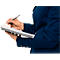 Person writing in a notebook with a silver pen. The blue blazer is visible in the image section.