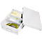White storage box with office supplies: sticky notes, hole punch, stapler. The lid is slightly open.