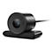 Webcam Lenovo FHD noire. Forme ronde avec lentilles, texte "Lenovo FHD Webcam".