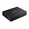Un mini-PC Lenovo noir. Le mot "Lenovo" est écrit en haut. De nombreux ports à l'avant.