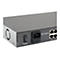 Rückseite eines grauen Netzwerk-Switches mit Netzschalter, Stromanschluss und Ethernet-Ports.
