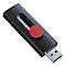 Clé USB noire avec bouton rouge et bande argentée. Inscription : Lexar.