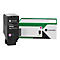 Cartouche de toner Lexmark noire et emballage vert. La cartouche indique "Magenta".
