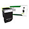 Schwarze Lexmark Tonerpatrone und Verpackung. Auf der Verpackung steht 'Lexmark' und 'Unison'.