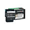 Lexmark Tonerkartusche C544X1KG, schwarz, mit Verpackung, vor weißem Hintergrund. Auf der Kartusche Text.