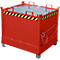 Red metal container with lid and handles. Black and yellow warning stripes, detail of the closure.