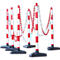 Six red and white striped barrier posts with chains, set up for demarcation.