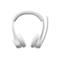 Casque blanc avec microphone sur fond blanc.