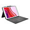 Ein iPad mit Tastatur und Stift, Display zeigt rote, rosa und weisse Wellenmuster.