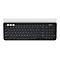 Drahtlose Logitech-Tastatur, schwarz, mit hellgrauem oberen Rand und weißen Tastenbeschriftungen.