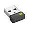 Ein grauer USB-Empfänger von Logitech. Der Stecker ist silberfarben, der Rest ist grau mit grünem Z-Logo und Logi-Schriftzug.