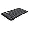 Schwarze, kabellose Tastatur mit grauen Tasten. WeiÃŸe Akzenttasten.