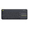 Schwarze kabellose Logitech Tastatur mit integriertem Touchpad und gelber Maustaste oben links.