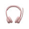 Casque rose clair avec microphone sur fond blanc.
