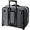 Valise trolley noire avec poignée extensible et accents rouges. Roues et support.
