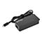 Schwarzes Manhattan USB-C Ladegerät mit 65 Watt Leistung und fest verbundenem Kabel vor weißem Hintergrund.