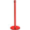 Red stanchion. A red, cylindrical tube stands on a round foot. At the top are four recesses.