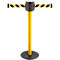 Yellow and black barrier tape, standing on a black base. Bollard has a black head.