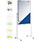 White, mobile whiteboard with blue wedge and accessories. In the background, various items are shown: pens, magnets, paper, sponge and memo.