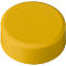 Yellow, round button with rounded edges placed on a white surface.