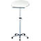 An adjustable standing desk with a white, crescent-shaped tabletop. It stands on a silver cross base with casters.