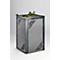 Grey metal box, topped with plants, with diagonal air vents in the corners.